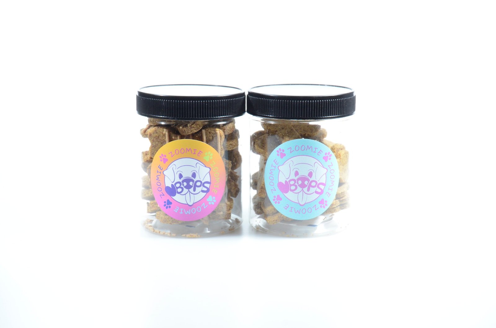 Two jars of Zoomie Boops dog treats